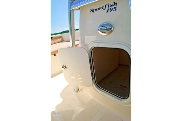 Slide: The Image of Manufacturer Provided Image: 2023 Scout 195 Sportfish boat storage compartment with open hatch. - 20