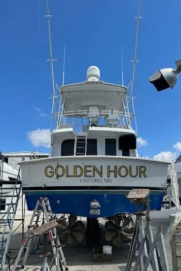 Slide: The Image of 2002 Hatteras 55 Convertible yacht "Golden Hour" in dry dock, Oxford MS. - 14