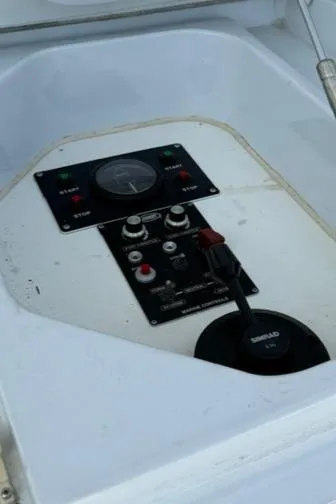 Slide: The Image of Control panel of a 2002 Hatteras 55 Convertible yacht. - 21