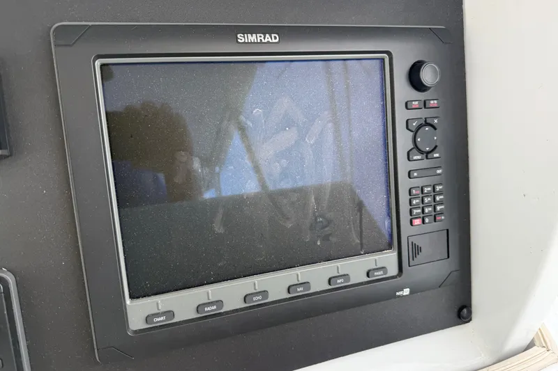 Slide: The Image of Simrad navigation display on a 2002 Hatteras 55 Convertible yacht. - 35