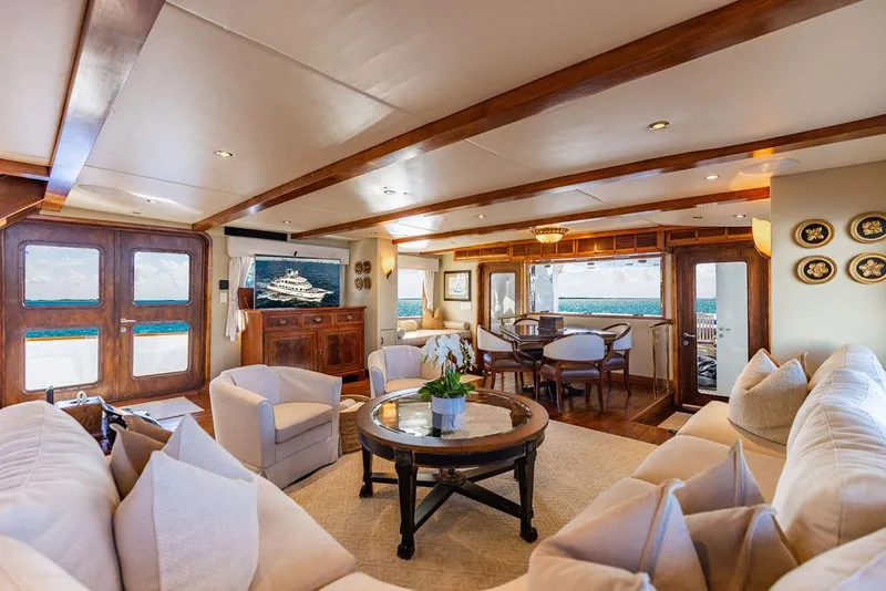 Slide: The Image of Luxurious yacht interior with plush seating, modern decor, and ocean views, Crystal Yachts 2009. - 9