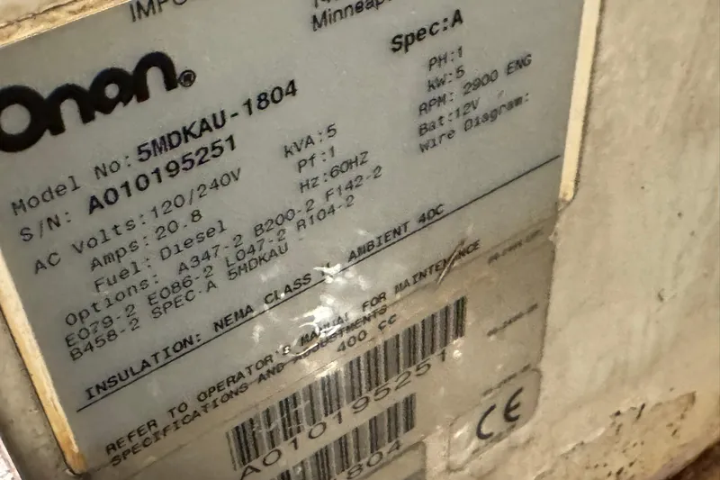 Slide: The Image of Label on Onan generator, model 5MDKAU-1804, serial A010195251, for DeFever 44, 1991. - 78