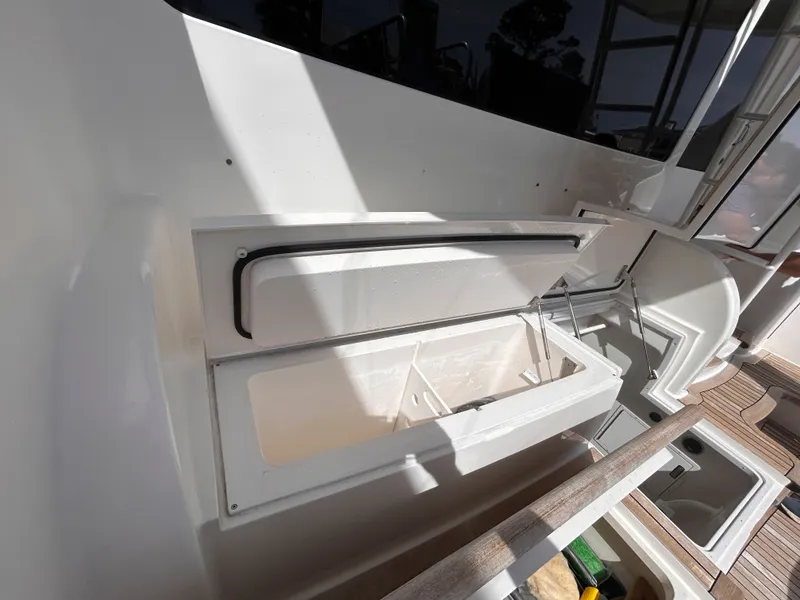 Slide: The Image of Viking ENC FB 2014 boat with open storage compartment lid. - 11