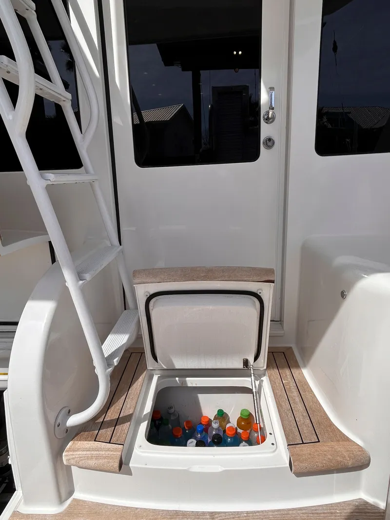 Slide: The Image of Cooler on a 2014 Viking ENC FB boat with beverages. - 13