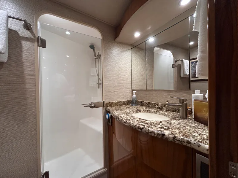 Slide: The Image of Luxurious bathroom in a 2014 Viking ENC FB boat. - 29