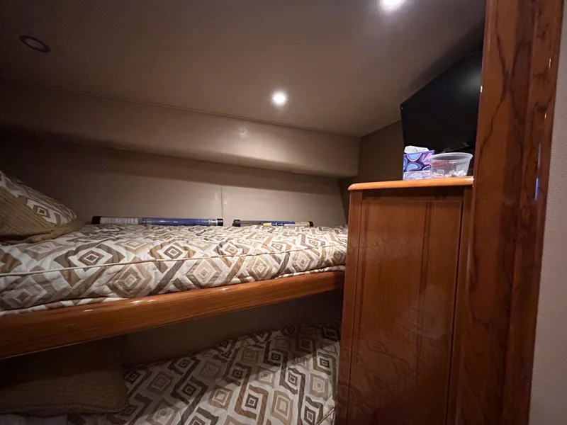 Slide: The Image of Interior of a 2014 Viking ENC FB yacht with bunk bed. - 31
