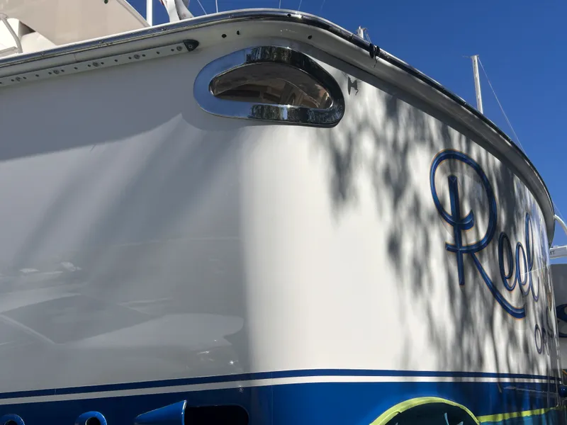 Slide: The Image of Viking ENC FB 2014 boat hull with blue lettering. - 4