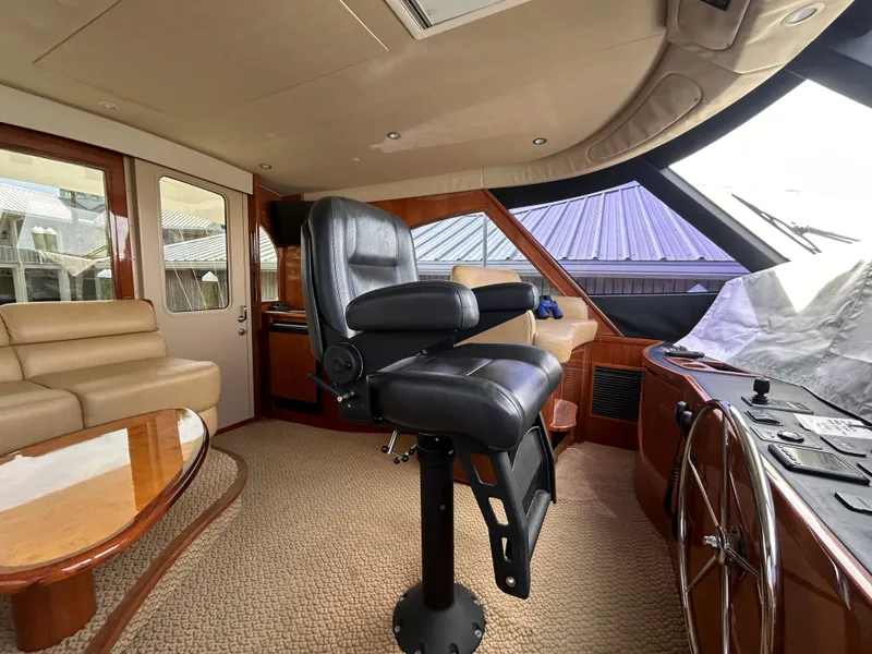 Slide: The Image of Interior of a 2014 Viking ENC FB yacht with leather seating. - 43