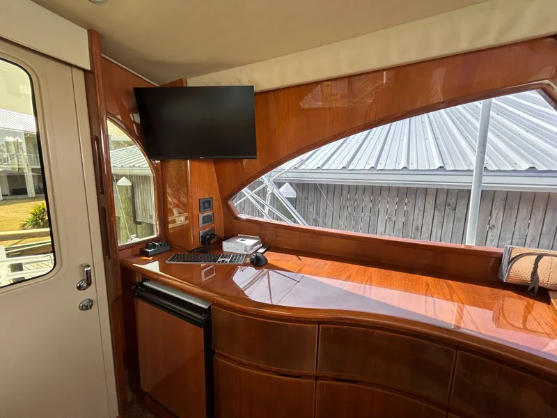 Slide: The Image of Interior of a 2014 Viking ENC FB yacht with wood paneling. - 49