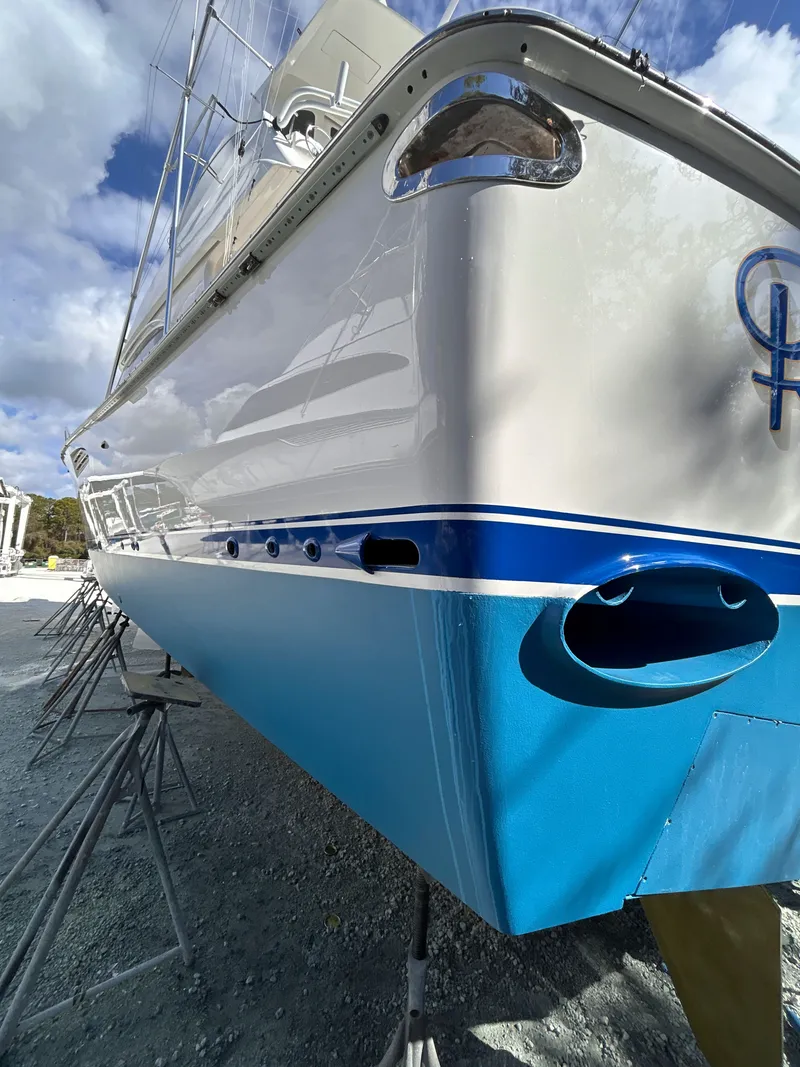Slide: The Image of Viking ENC FB 2014 yacht in dry dock, blue and white paint. - 6