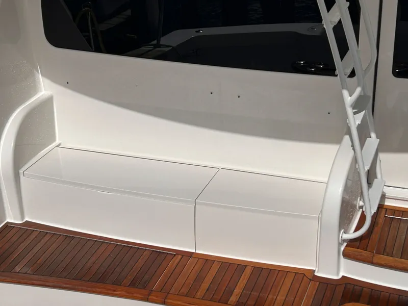 Slide: The Image of Viking ENC FB 2014 boat with wooden deck and white seating. - 9