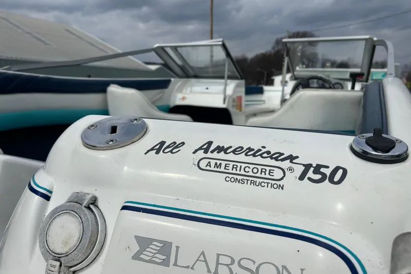 Slide: The Image of 1993 Larson All American 160 boat interior with Americore construction details. - 10