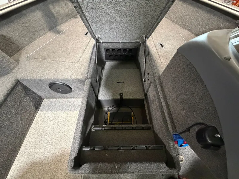Slide: The Image of Interior of a 2012 Lund 1775 Impact boat with storage compartment. - 10
