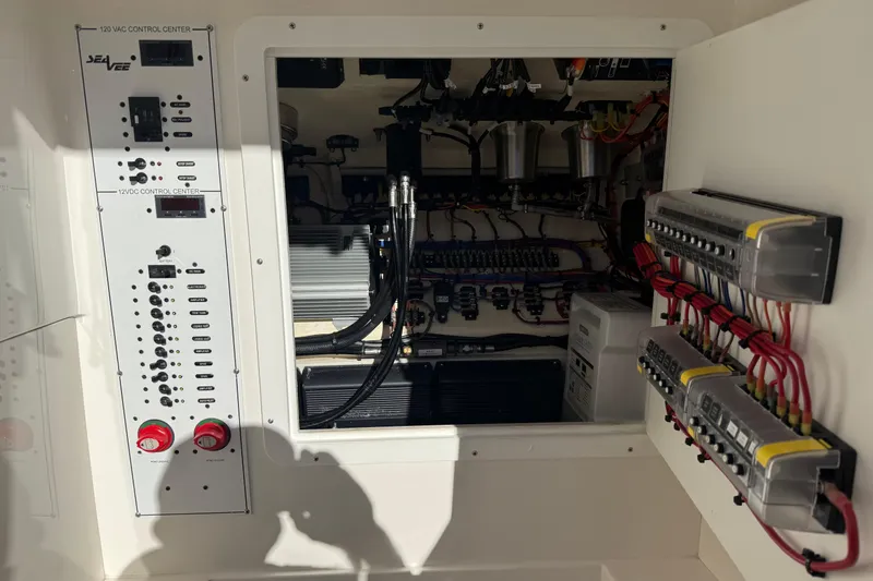 Slide: The Image of 2024 SeaVee 290B electrical control panel with wiring and components. - 7