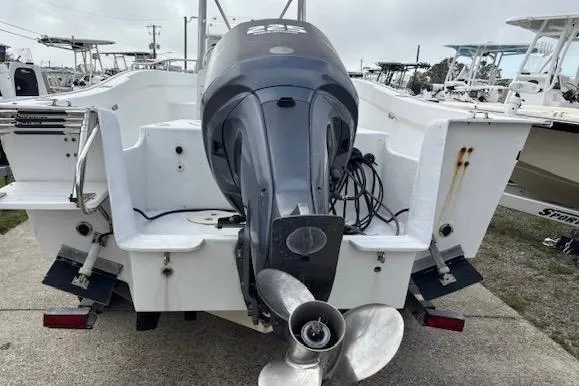 Slide: The Image of 1995 Cape Horn 21 boat with outboard motor, viewed from the rear on a trailer. - 9