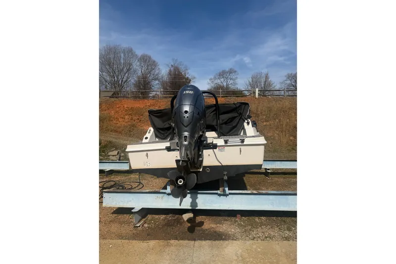 Slide: The Image of 2025 Starcraft SVX 211 OB boat with outboard motor on a trailer. - 8