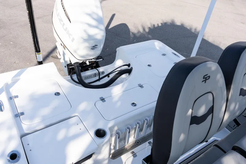 Slide: The Image of 2026 Sea Pro 230 Bay boat with Suzuki outboard motor and seating area. - 11