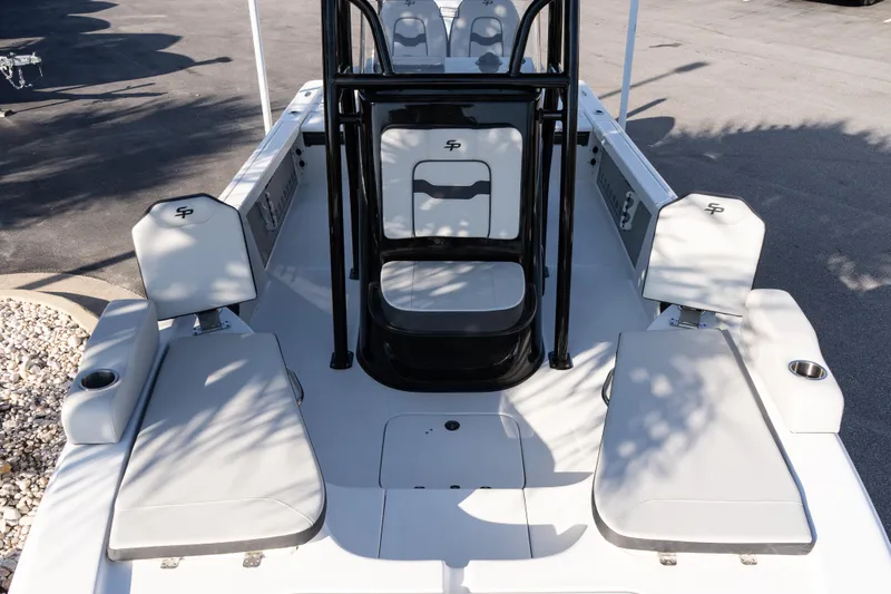 Slide: The Image of 2026 Sea Pro 230 Bay boat interior with seating and console, showcasing modern design. - 19
