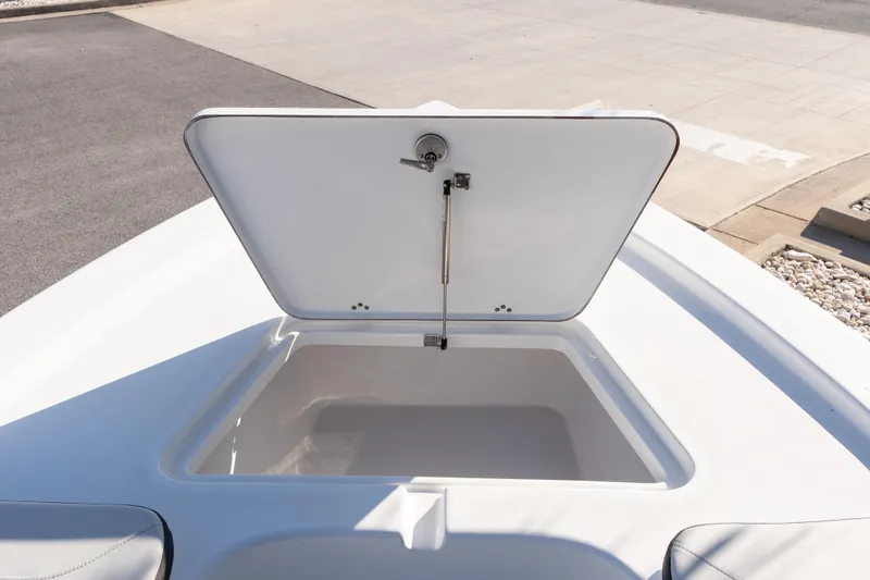 Slide: The Image of Open storage compartment on 2026 Sea Pro 230 Bay boat deck. - 20