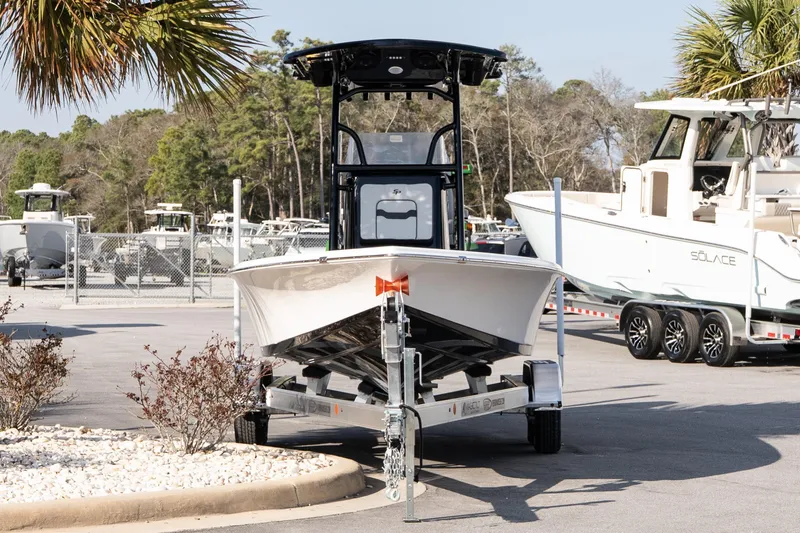 Slide: The Image of 2026 Sea Pro 230 Bay boat on trailer in marina setting. - 3