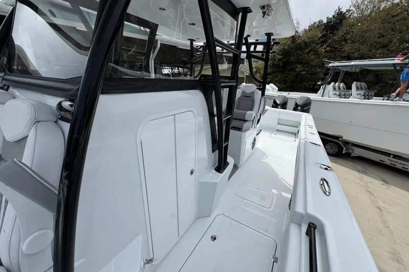 Slide: The Image of 2026 Invincible 36 Catamaran with sleek design and spacious deck layout. - 23