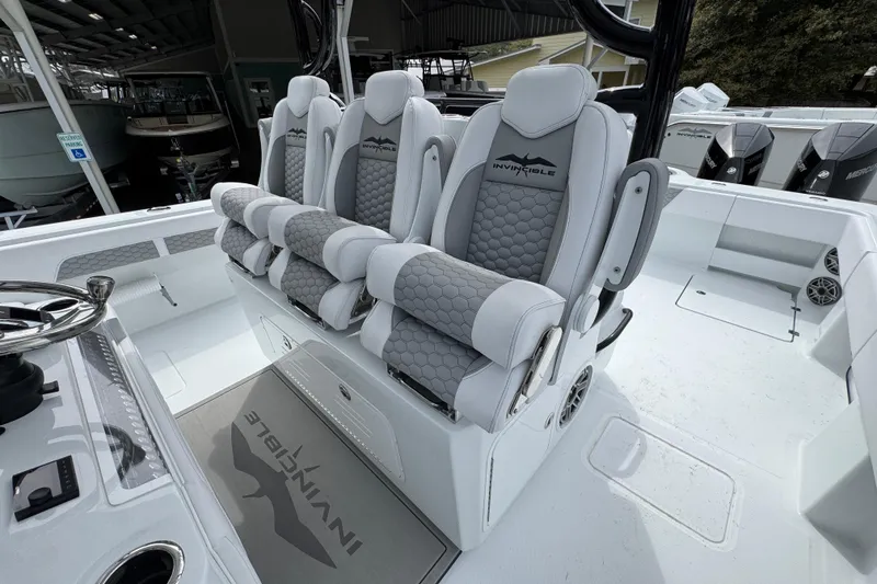 Slide: The Image of Luxury seating on 2026 Invincible 36 Catamaran, featuring sleek design and premium materials. - 27