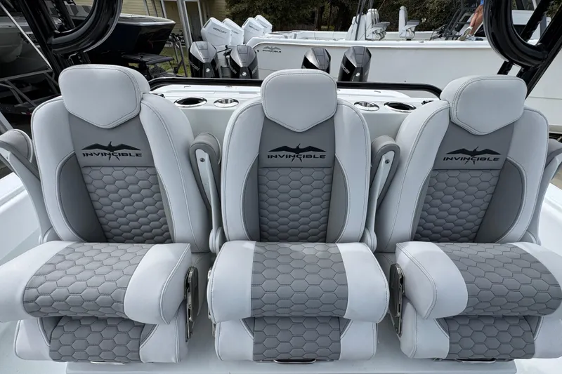 Slide: The Image of Luxurious seating on 2026 Invincible 36 Catamaran, featuring sleek gray upholstery and ergonomic design. - 28