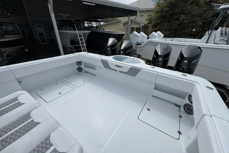 Slide: The Image of 2026 Invincible 36 Catamaran with spacious deck and powerful Mercury engines. - 40