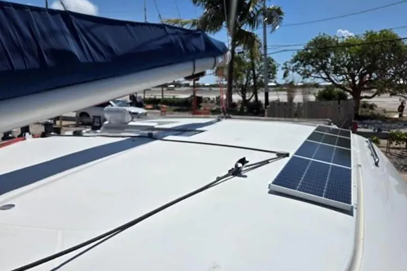 Slide: The Image of 2008 Fountaine Pajot Salina 48 Evolution catamaran with solar panels on deck. - 13