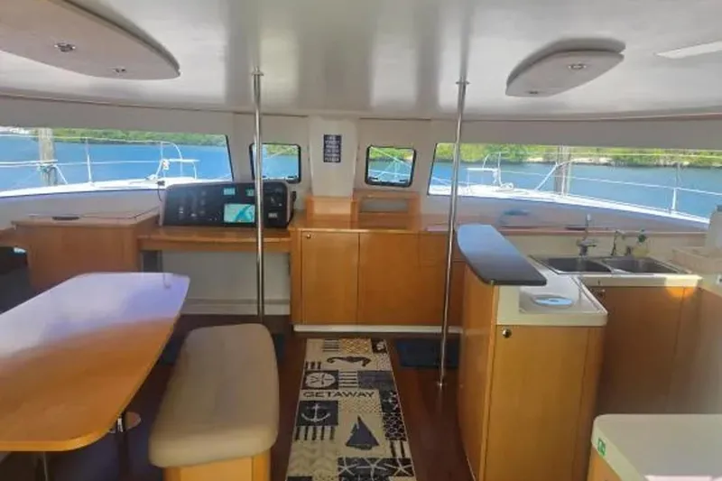 Slide: The Image of Interior of 2008 Fountaine Pajot Salina 48 Evolution catamaran with modern kitchen and dining area. - 17