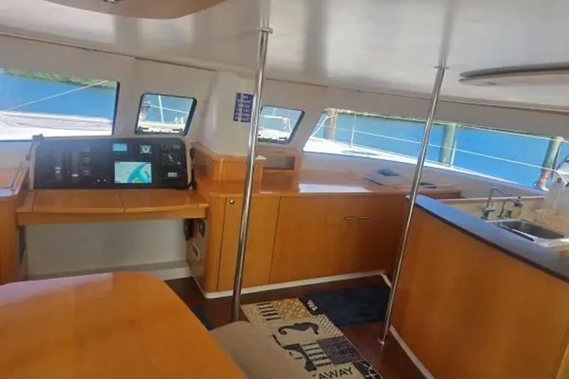 Slide: The Image of Interior of 2008 Fountaine Pajot Salina 48 Evolution catamaran with navigation station and kitchen area. - 20