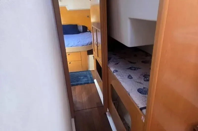 Slide: The Image of Interior of 2008 Fountaine Pajot Salina 48 Evolution catamaran, featuring cozy cabin spaces. - 23