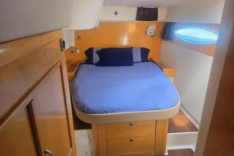 Slide: The Image of Cozy cabin interior of 2008 Fountaine Pajot Salina 48 Evolution with bed and porthole. - 25