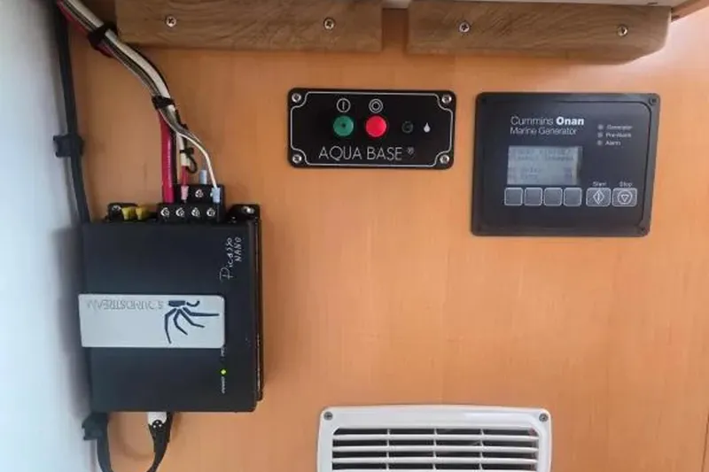 Slide: The Image of Control panel of 2008 Fountaine Pajot Salina 48 Evolution with Cummins Onan marine generator. - 27