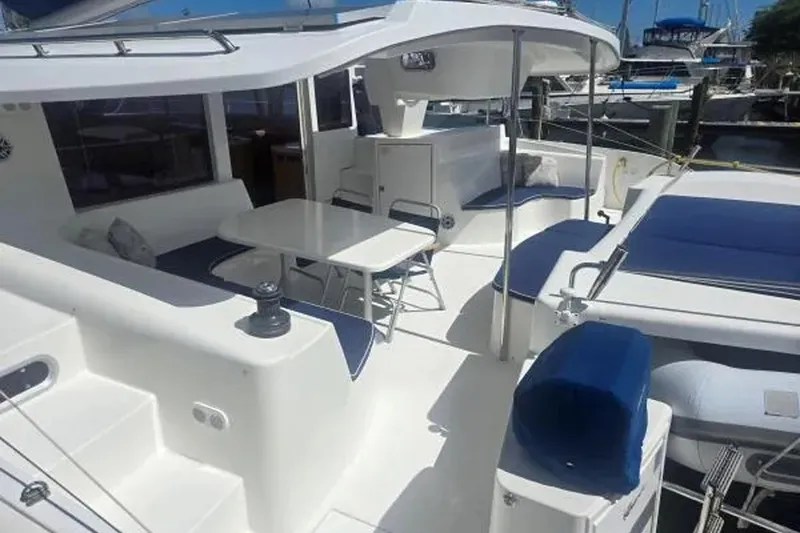 Slide: The Image of 2008 Fountaine Pajot Salina 48 Evolution catamaran with spacious deck and seating area. - 6