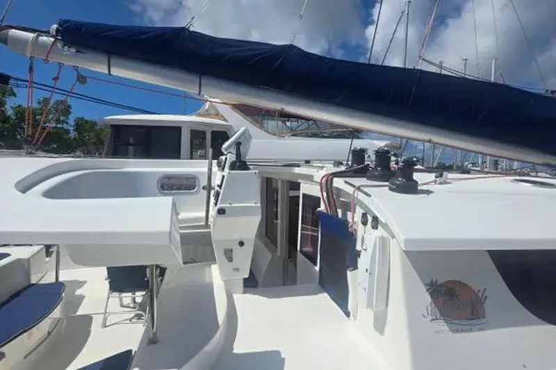 Slide: The Image of 2008 Fountaine Pajot Salina 48 Evolution catamaran deck with sail and equipment. - 7