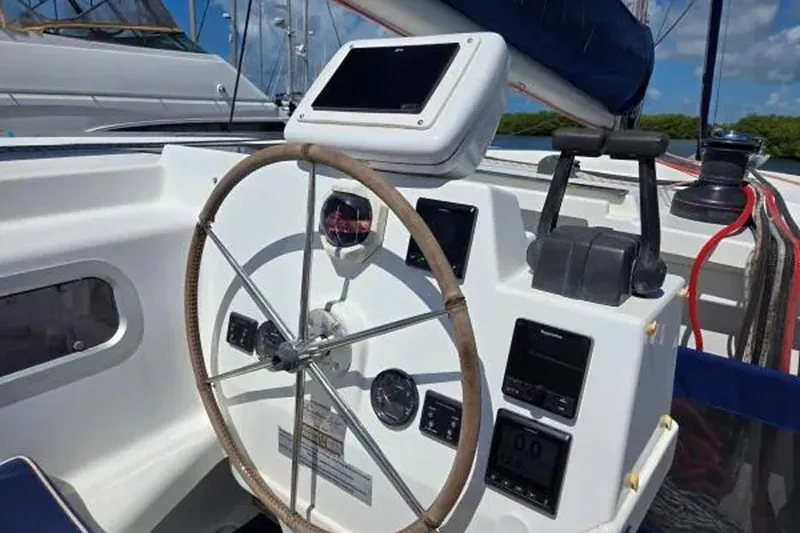 Slide: The Image of Helm of 2008 Fountaine Pajot Salina 48 Evolution catamaran with navigation instruments. - 8