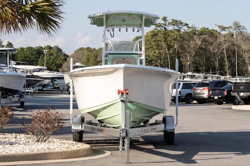 Slide: The Image of 2026 Sea Pro 225FLXR Sandbar boat on trailer in parking lot. - 3