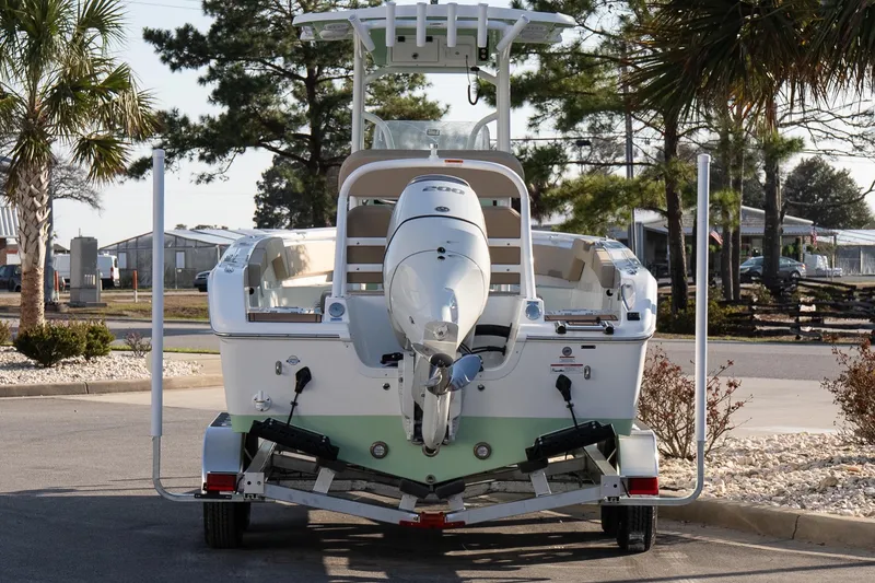 Slide: The Image of 2026 Sea Pro 225FLXR Sandbar boat on trailer, parked outdoors. - 5