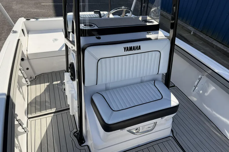 Slide: The Image of 2021 Yamaha Boats 195 FSH Sport interior with sleek seating and modern design. - 13