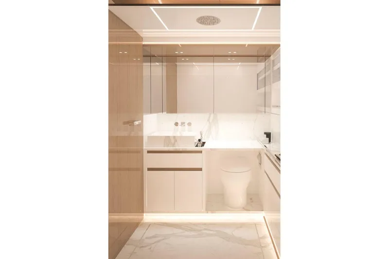 Slide: The Image of Luxurious modern bathroom in 2027 CNM Continental Tender yacht, featuring sleek design and elegant finishes. - 2