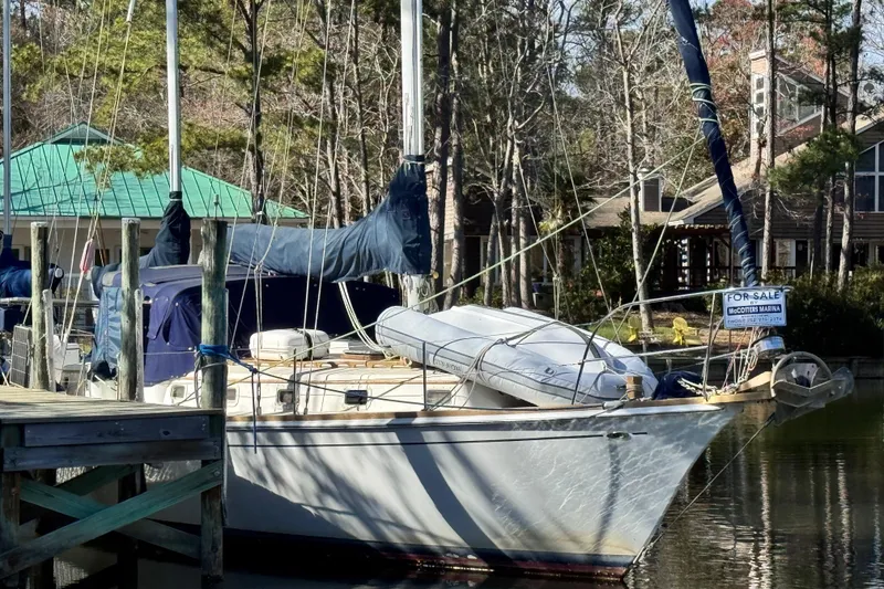 Slide: The Image of 1980 Dickerson Center Cockpit Ketch sailboat docked, for sale at marina. - 5