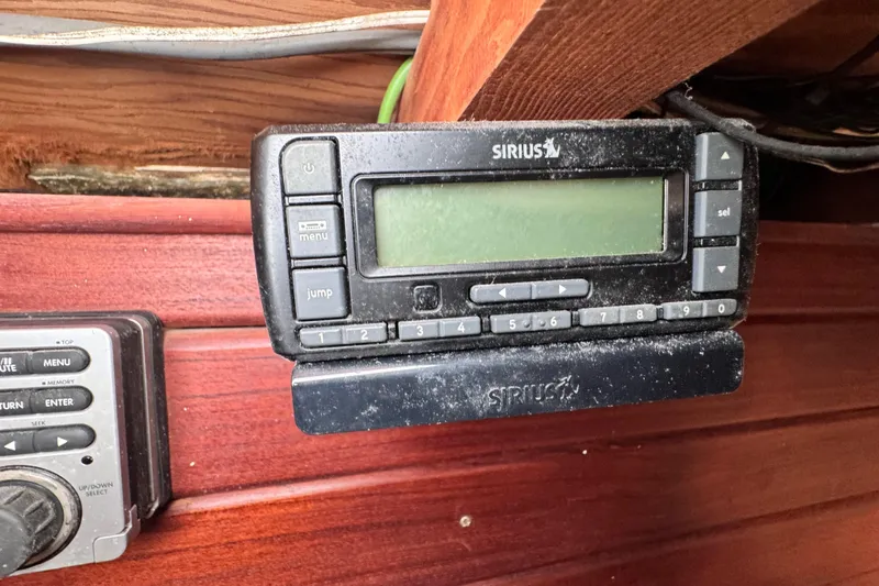 Slide: The Image of Sirius radio receiver in a 1980 Dickerson Center Cockpit Ketch boat interior. - 52