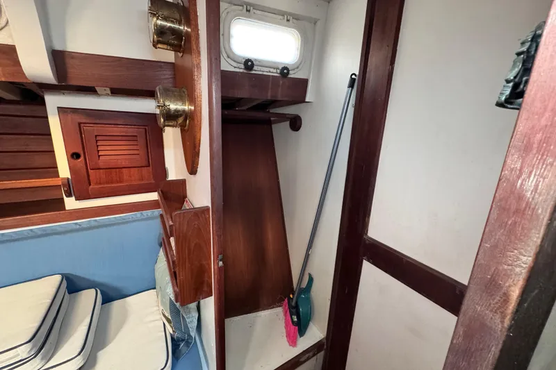 Slide: The Image of Deep closet beyond the salon shares a hallway with the head - 58