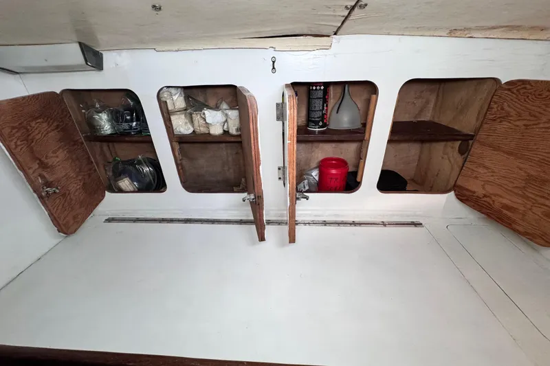 Slide: The Image of storage in the hallway that is between the aft suite and the main salon area - 71