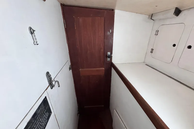 Slide: The Image of hallway and door leads to the aft suite - 74