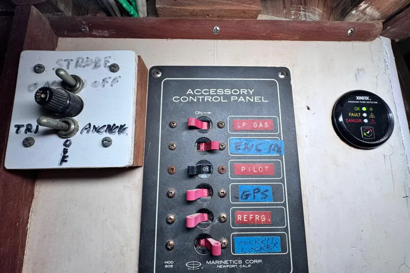 Slide: The Image of Control panel on 1980 Dickerson Center Cockpit Ketch with switches and fuse detector. - 77
