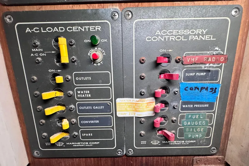 Slide: The Image of Electrical control panels on a 1980 Dickerson Center Cockpit Ketch sailboat. - 78