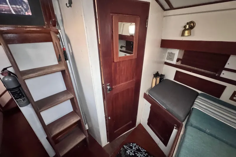 Slide: The Image of ladder is the companionway and the closed door is the head - 85