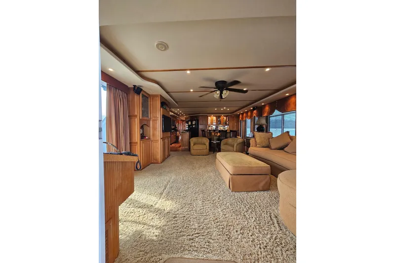 Slide: The Image of Luxurious interior of 2002 Sharpe 18x85 houseboat with plush seating and elegant decor. - 19